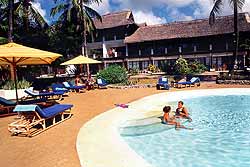 The pool area with rooms behind.